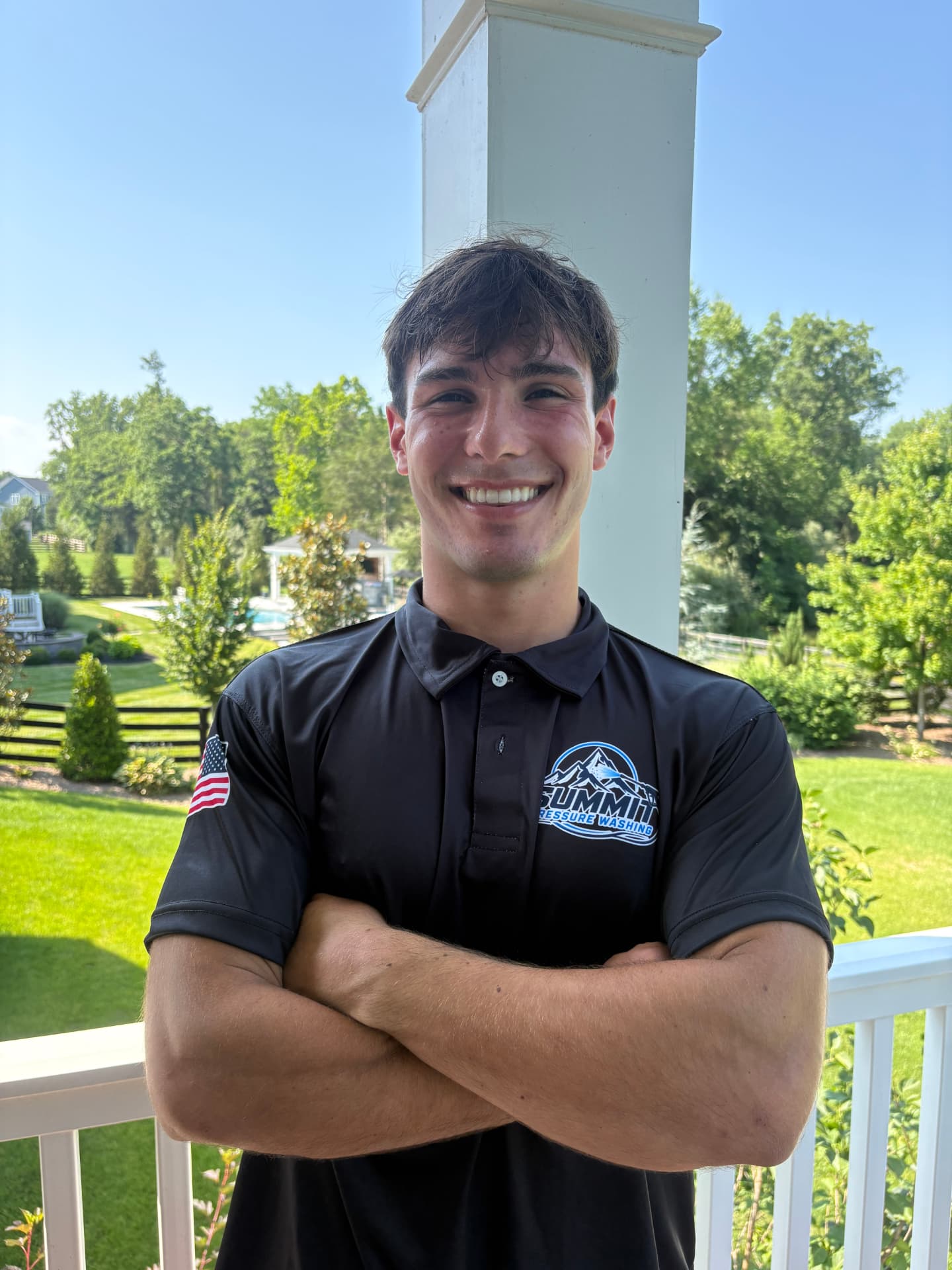 Owner of Summit Pressure Washing in branded polo